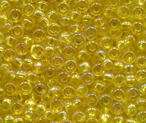 250 gr. 2,6mm Rocailles Sonnengelb Transparent AB 81010