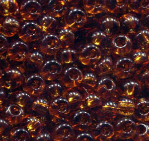 250 gr. 4 mm Rocailles Braun Transparent