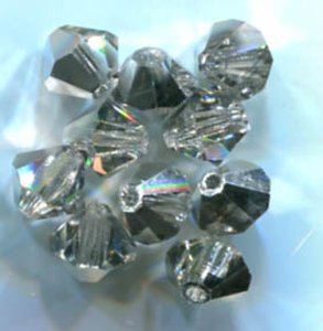 6mm Preciosa Doppelkegel Crystal Labrador Halb