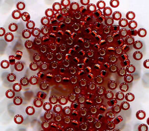 50gr. 15/0 Roc. Silverlined Dark Ruby 11D