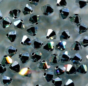 4mm Preciosa Doppelkegel Crystal Halb Labrador