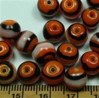 Glasperlen Orange-Schwarz-Weiß