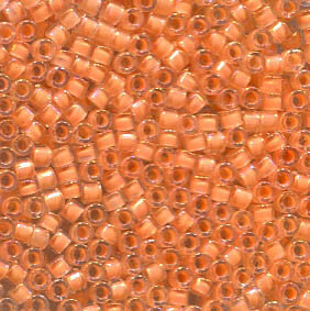 11/0 Delica Lined Flesh AB 67