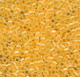 11/0 Delica Lined Crystal/Yellow Lüsternd 233