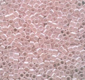 11/0 Delica Lined Crystal/Pale Salmon 234