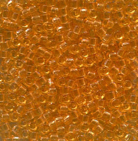 11/0 Delica Transparent Light Topaz  702