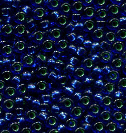 11/0 Roc. Emerald Lined Dark Saphire 1457