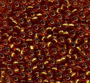 11/0 Roc. Silverlined Topaz 2422