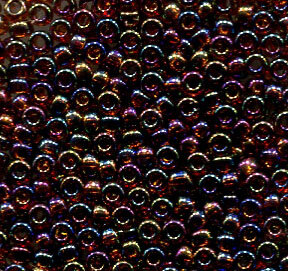11/0 Roc. Transparent Topaz AB 257